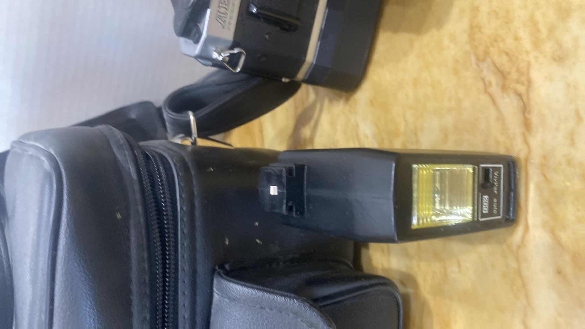 Photo 1 of VINTAGE CANON AE ONE PROGRAM 35 MM CAMERA WITH FLASH AND BAG