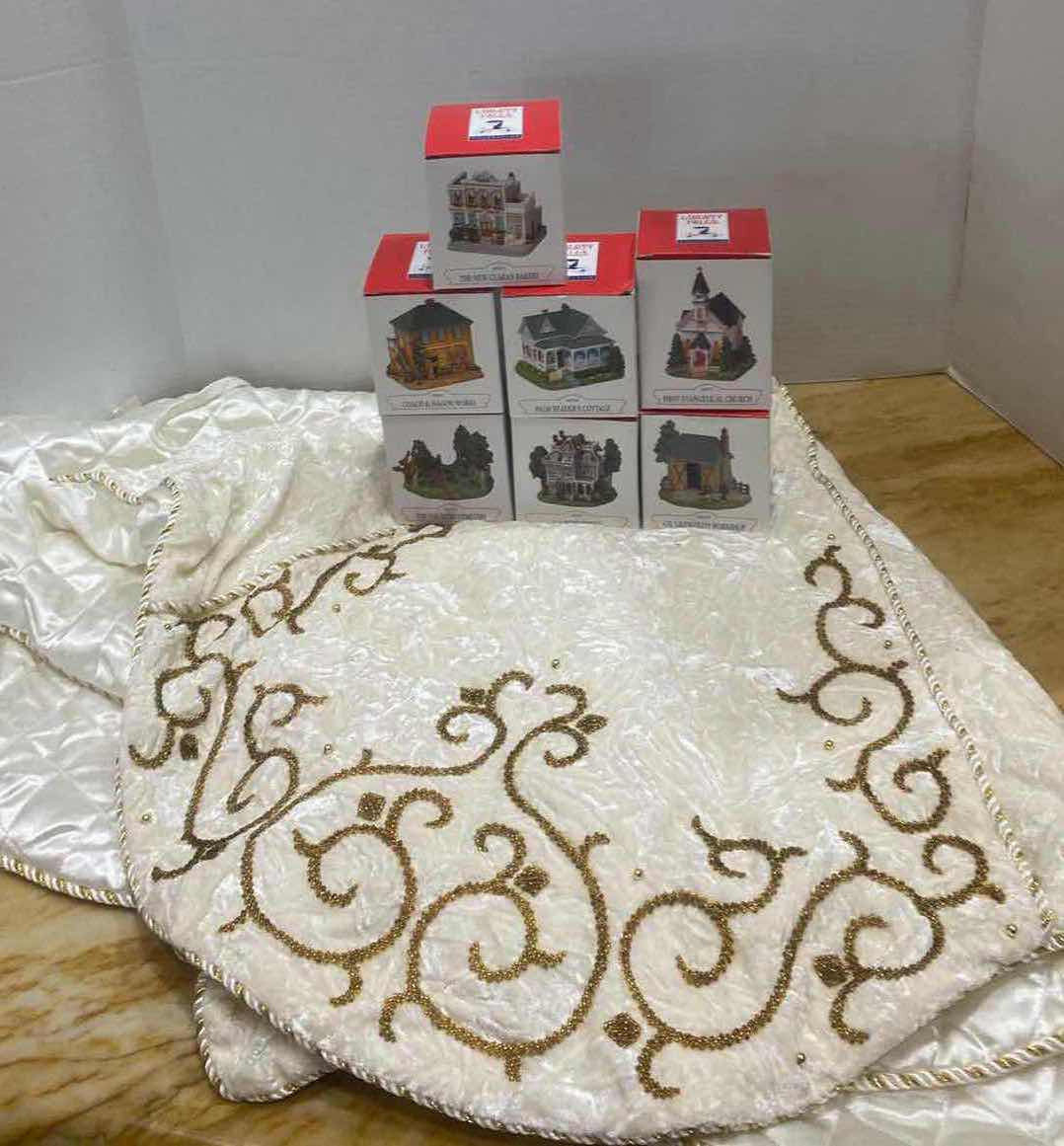 Photo 1 of SEVEN LIBERTY FALLS, COLLECTION, BUILDINGS AND GOLD AND WHITE CHRISTMAS TREE SKIRT