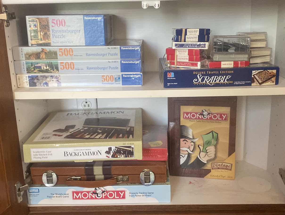 Photo 1 of CONTENTS OF CABINET BOARD GAMES AND PUZZLES
