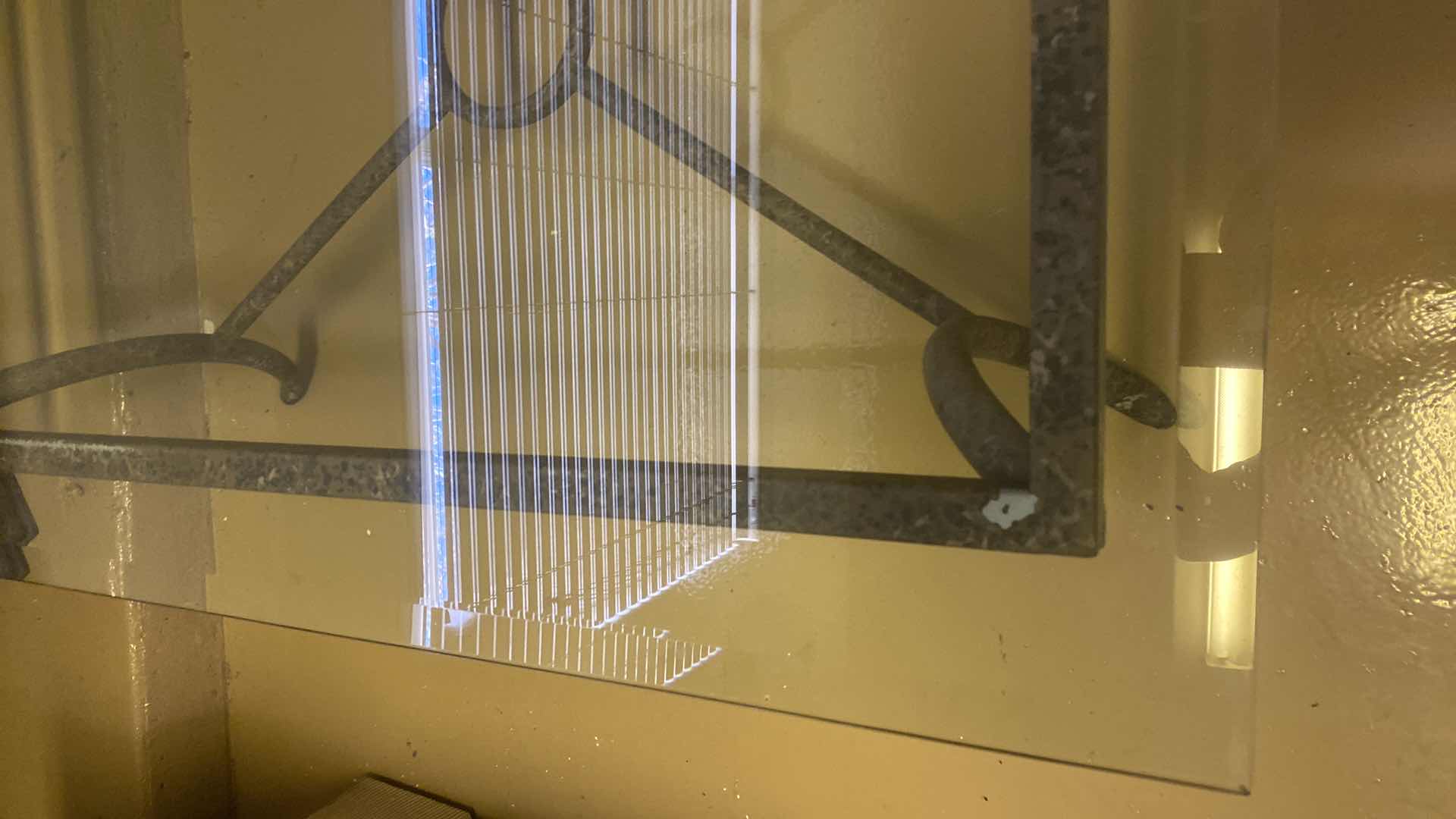 Photo 1 of METAL TABLE WITH GLASS TOP 42“ x 30“ H 17”