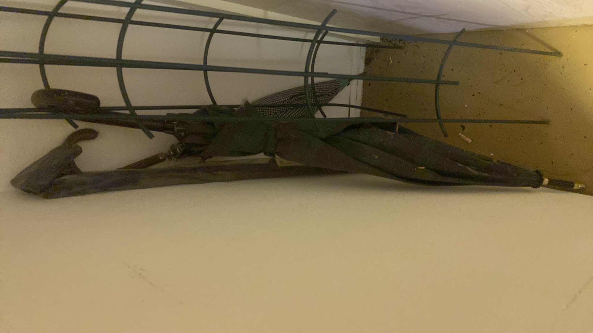 Photo 1 of TWO GOLF UMBRELLAS, AND METAL VINE SUPPORTS