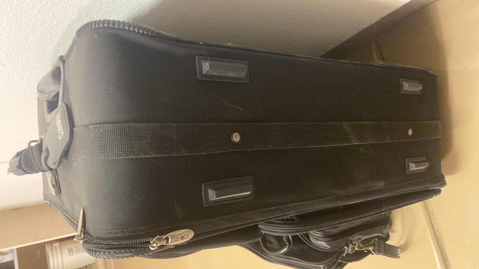 Photo 1 of LAPTOP BAG AND DAKOTA SUITCASE 22“ X 32“