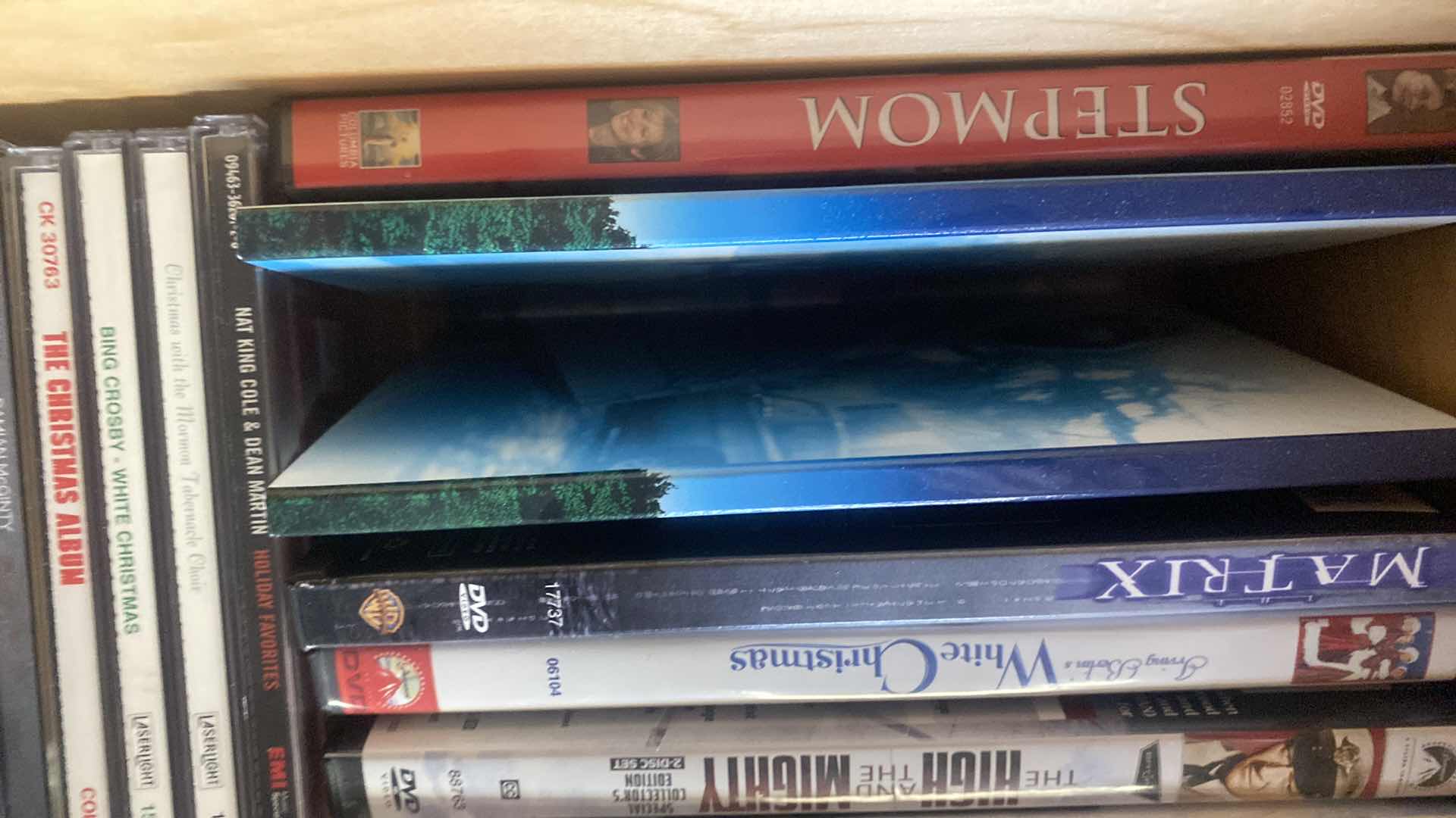 Photo 1 of CONTENTS OF DRAWER-DVDS AND CDS