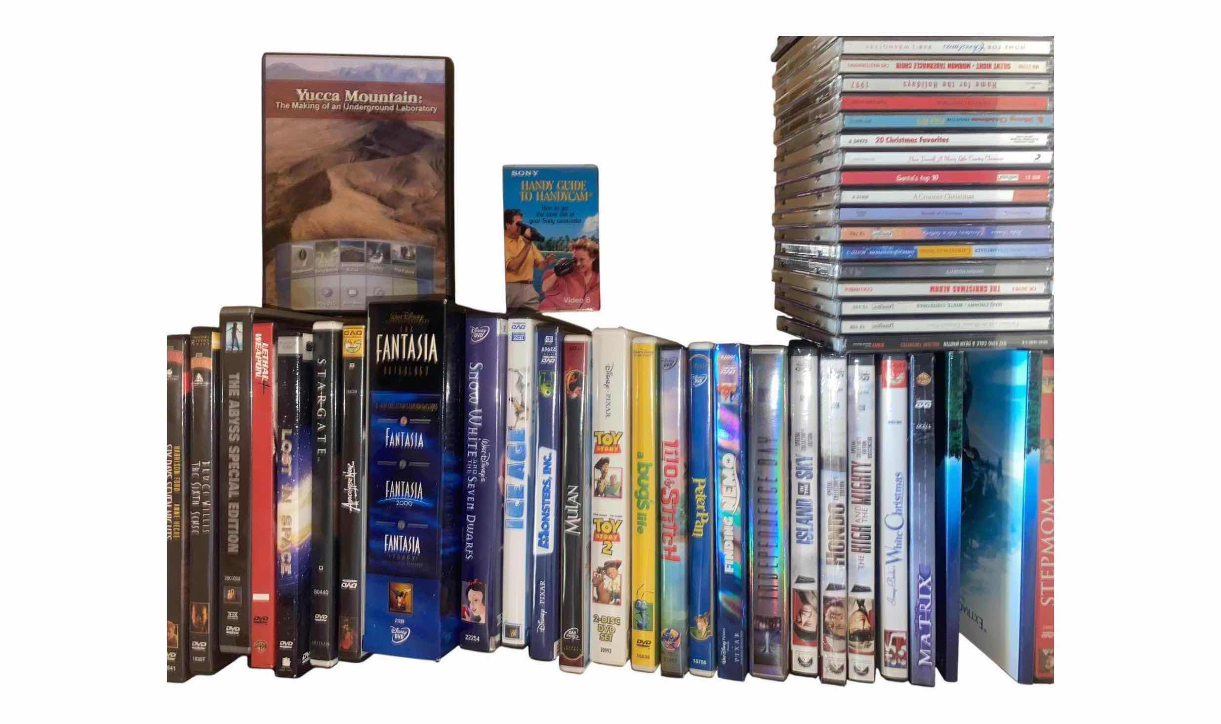 Photo 1 of CONTENTS OF DRAWER-DVDS AND CDS