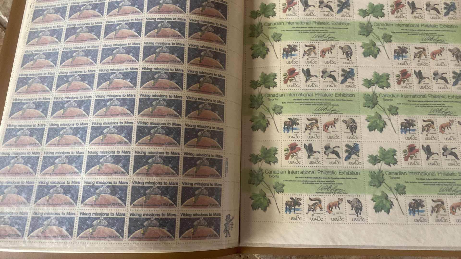 Photo 1 of VINTAGE MINT SHEET FILE WITH STAMP COLLECTION