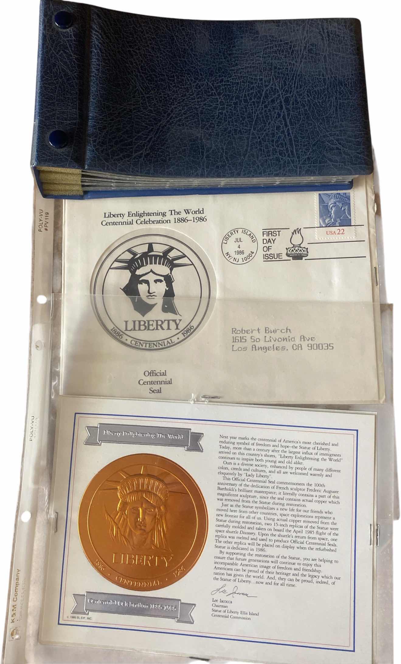 Photo 1 of STAMP COLLECTION ALBUM AND TWO OFFICIAL CENTENNIAL SEAL STATUE OF LIBERTY RESTORATION