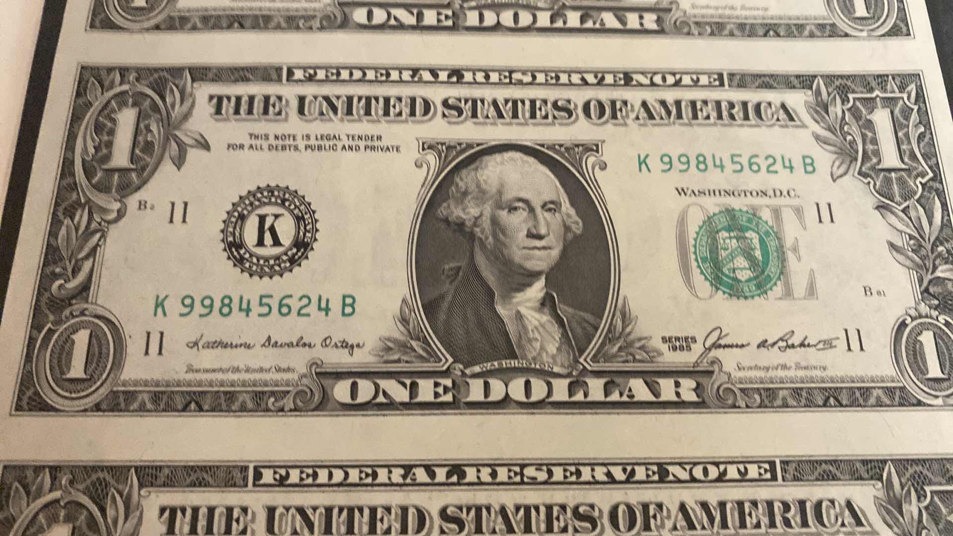 Photo 1 of VINTAGE 1985 BUREAU OF ENGRAVING AND PRINTING 4 $1 DOLLAR BILLS UNCUT