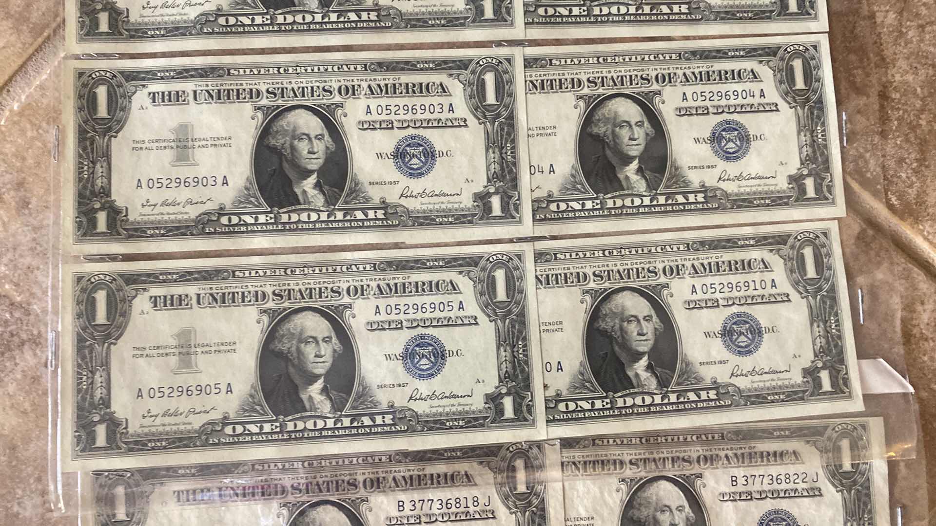 Photo 1 of VINTAGE 1957 & 1935 CIRCULATED SILVER CERTIFICATES ONE DOLLAR BILLS