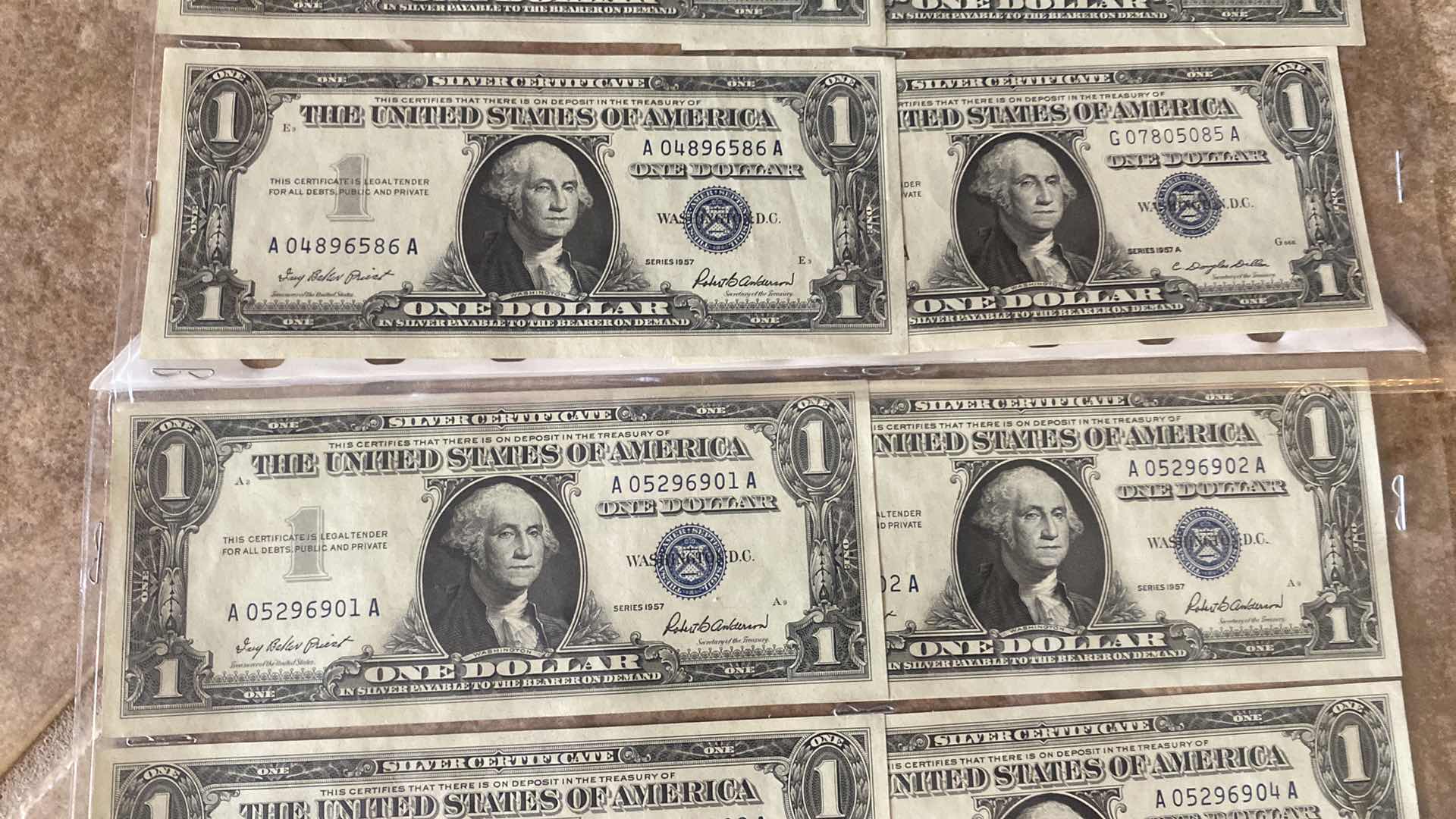 Photo 1 of VINTAGE 1957 & 1935 CIRCULATED SILVER CERTIFICATES ONE DOLLAR BILLS
