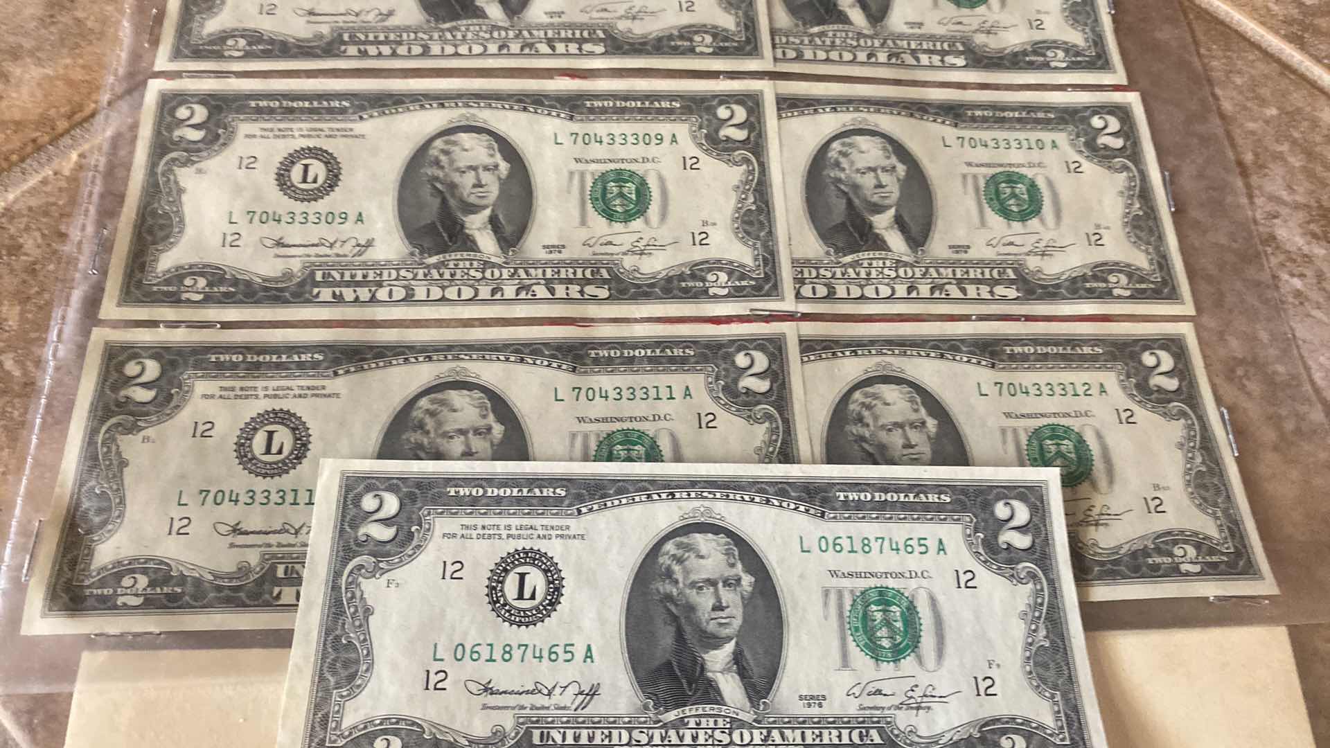 Photo 1 of 14-VINTAGE 1976 CIRCULATED $2 DOLLAR BILLS