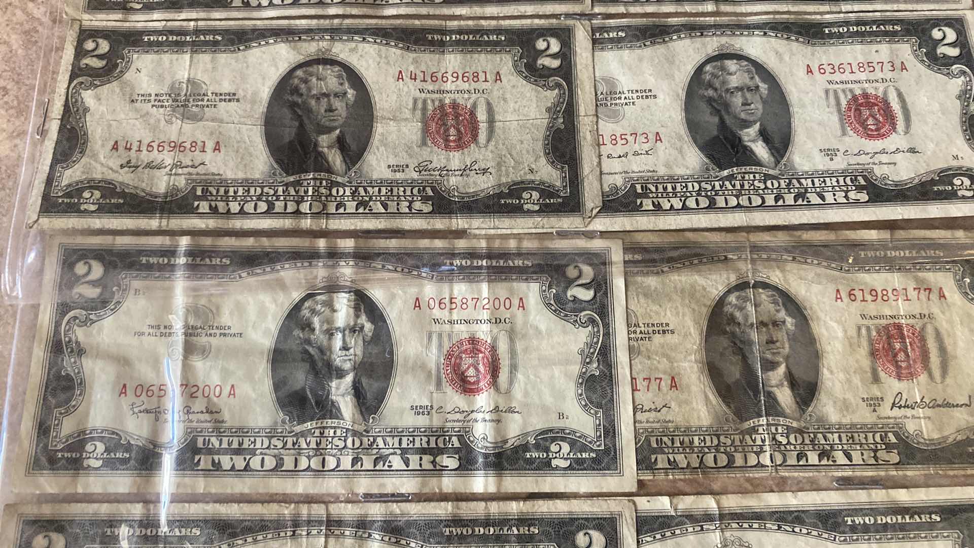 Photo 1 of 18-VINTAGE 1953 CIRCULATED $2 DOLLAR BILLS