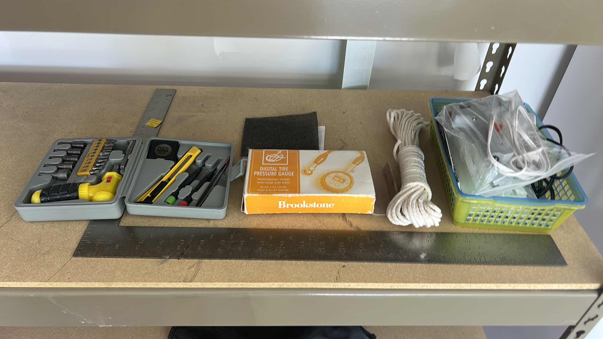 Photo 1 of GARAGE ITEMS- DIGITAL TIRE, PRESSURE GAUGE, GLUE GUN, GLUE STICKS, MINI TOOL KIT AND ANGLE