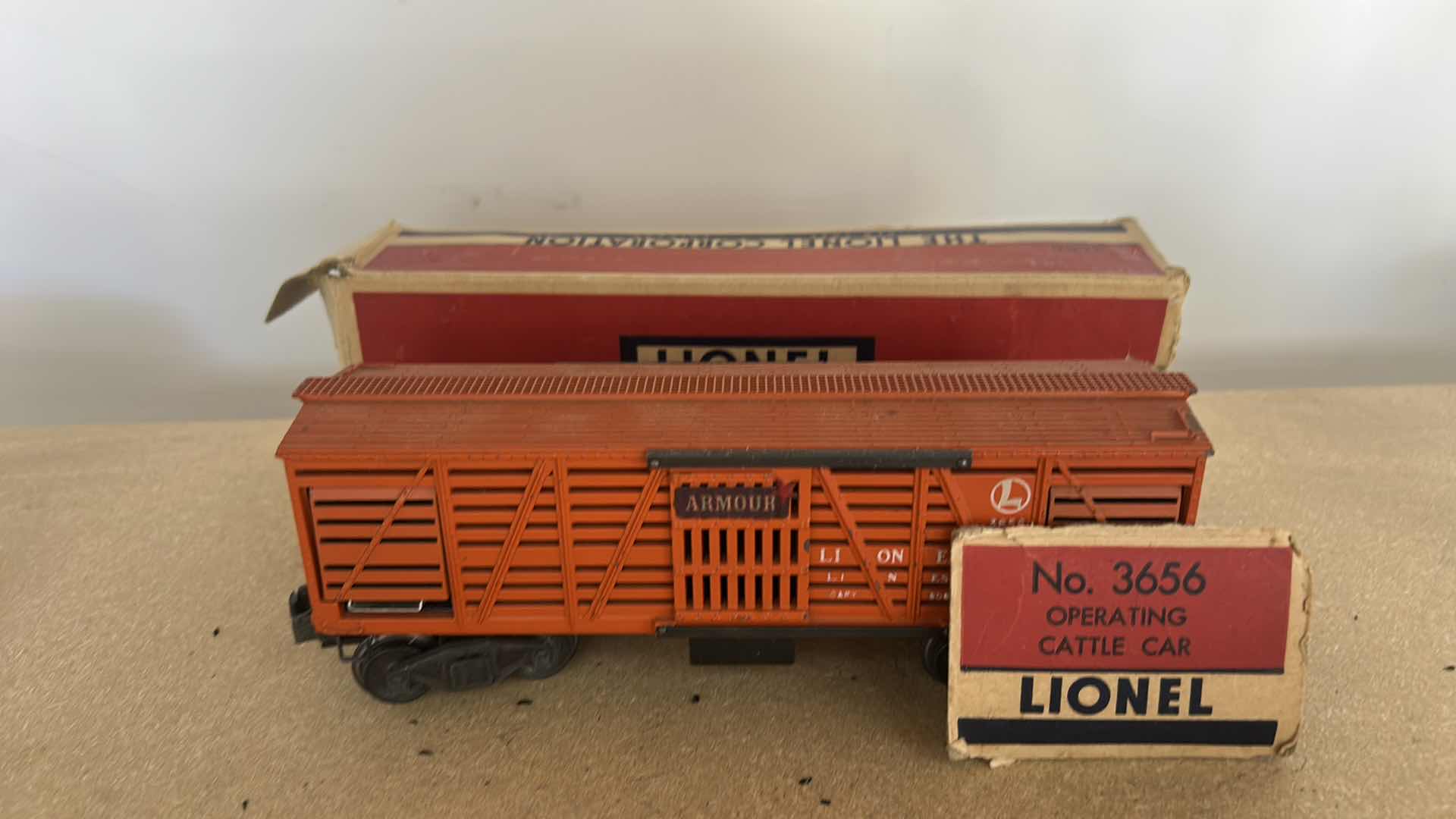 Photo 1 of VINTAGE LIONEL NO. 3656 OPERATING CATTLE CAR, ORIGINALLY MANUFACTURED IN THE POSTWAR ERA AROUND THE MID-1950S. WITH BOX OF COWS