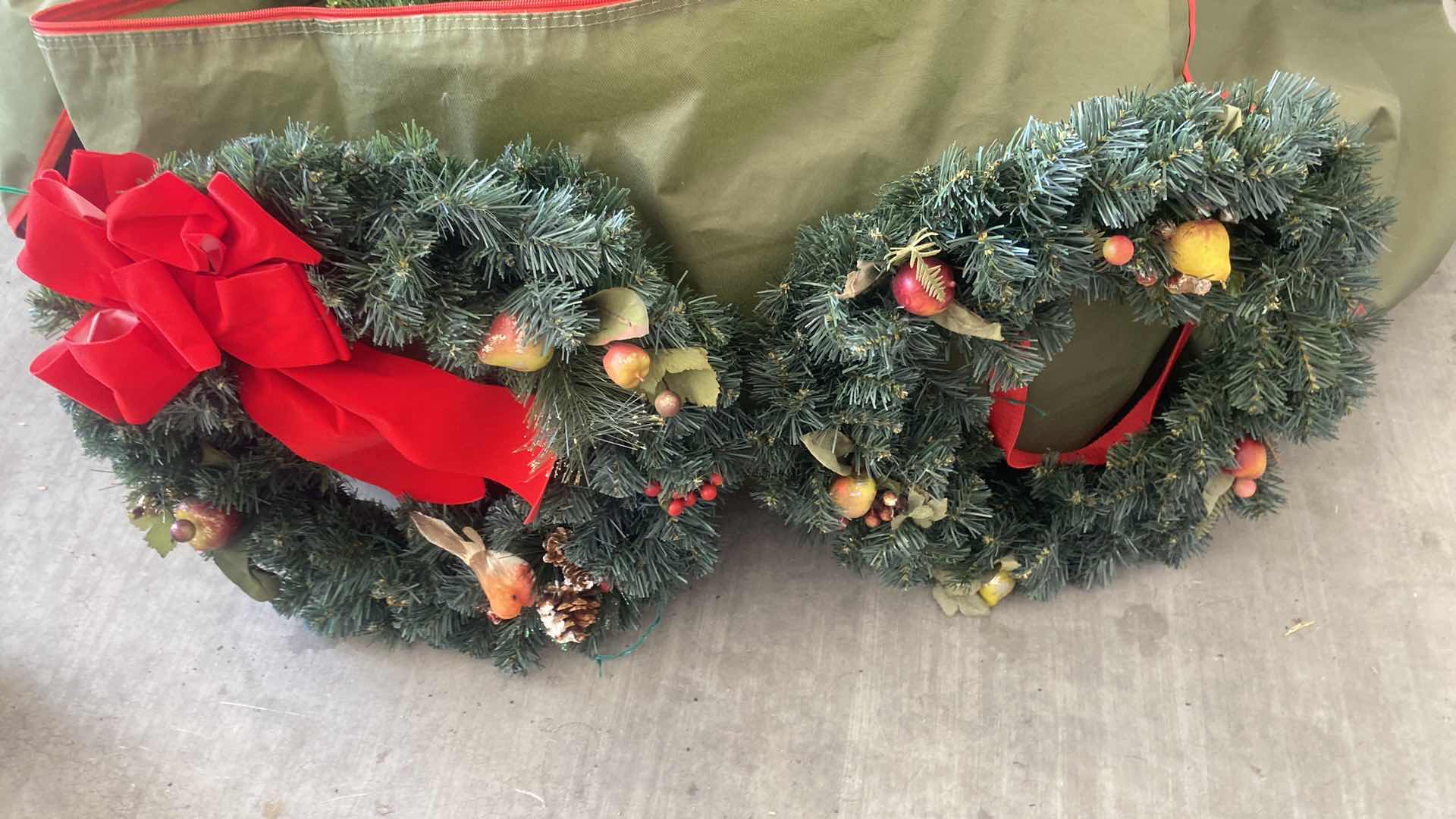 Photo 1 of ARTIFICIAL CHRISTMAS TREE APPROXIMATELY 6 FEET AND TWO WREATHS - INCLUDES STORAGE BAG