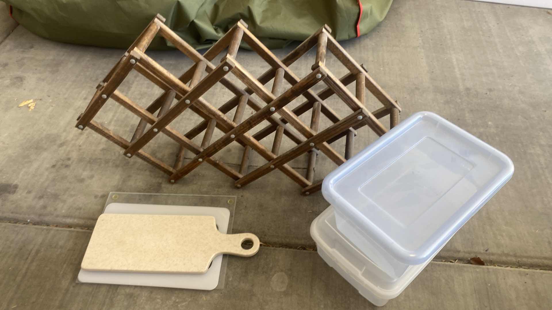 Photo 1 of WINE RACK, THREE CUTTING BOARDS, AND TWO PLASTIC SHOEBOXES