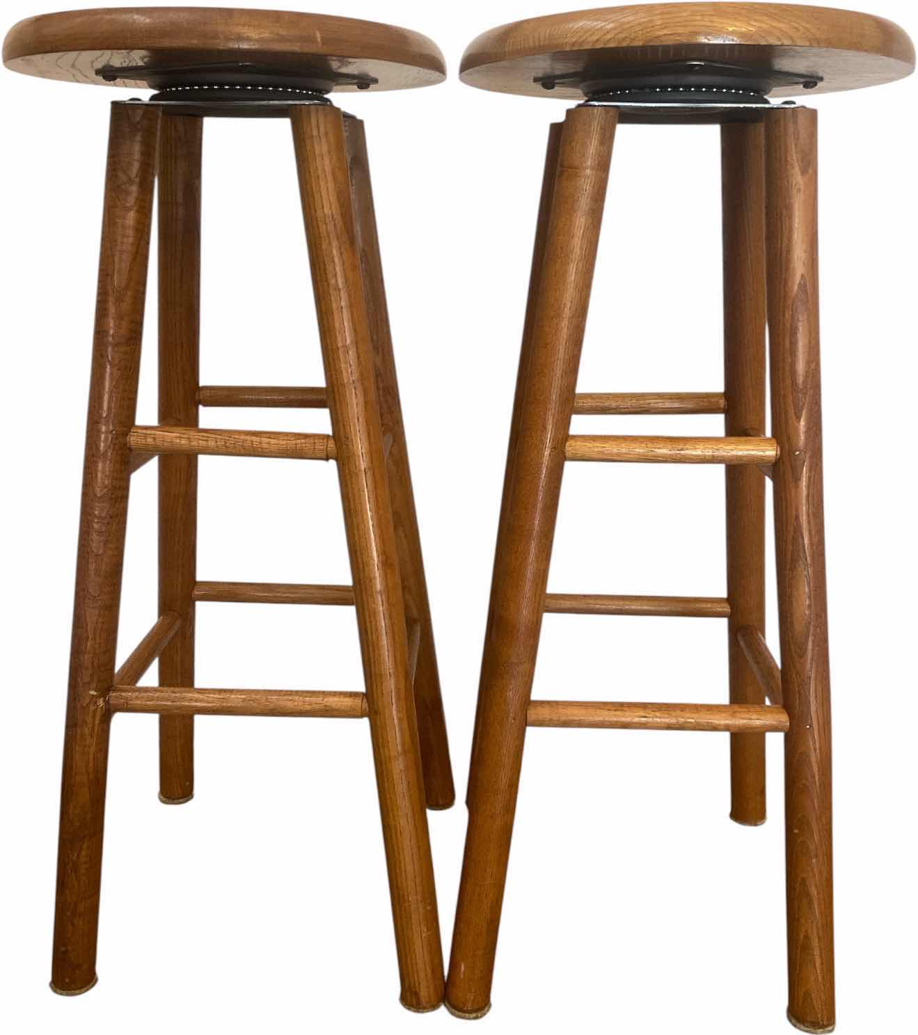 Photo 1 of SOLID ROUND TOP WOOD BARSTOOLS (2) H30”