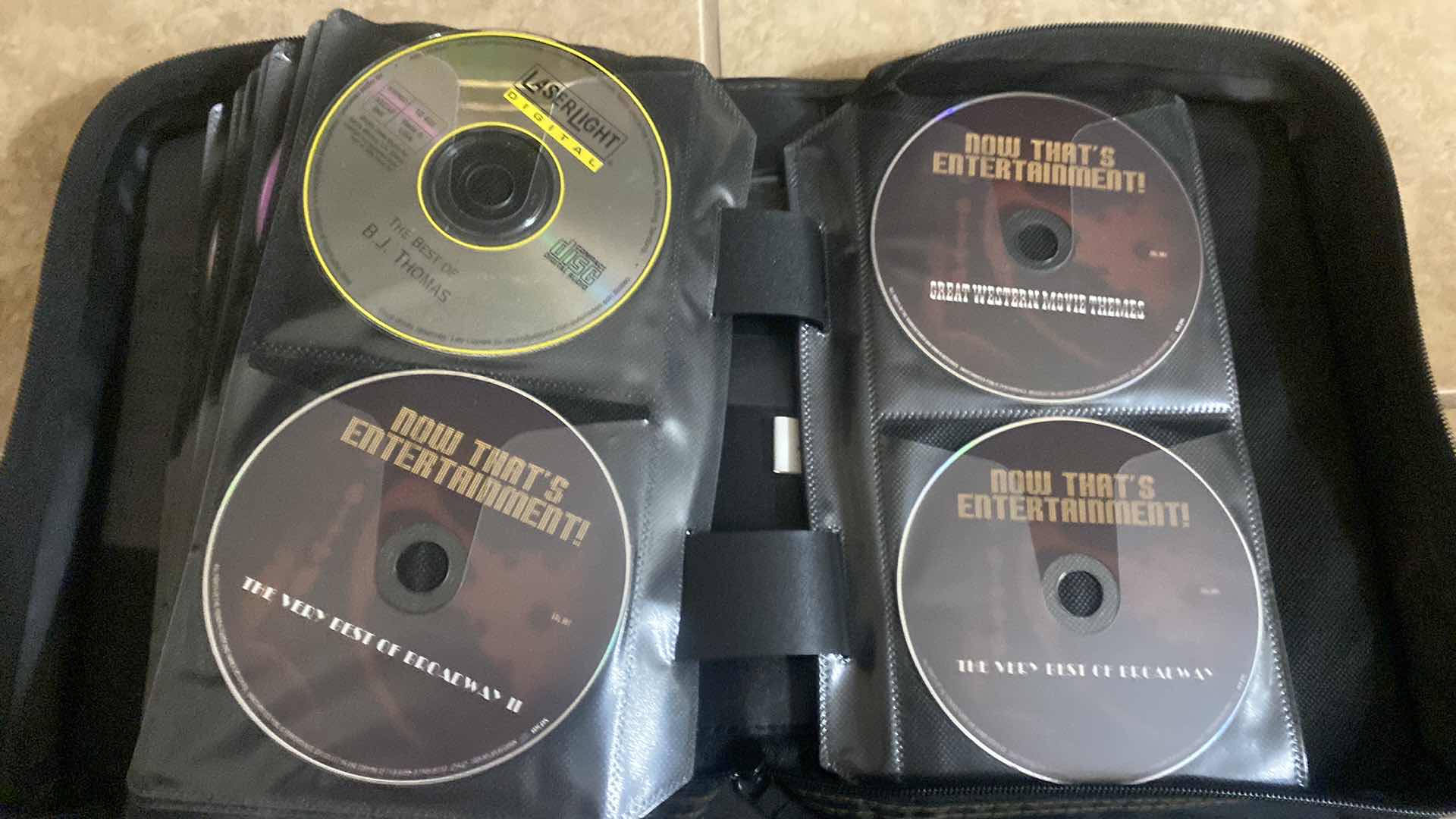 Photo 1 of CASE LOGIC CD WITH ASSORTED CDS
