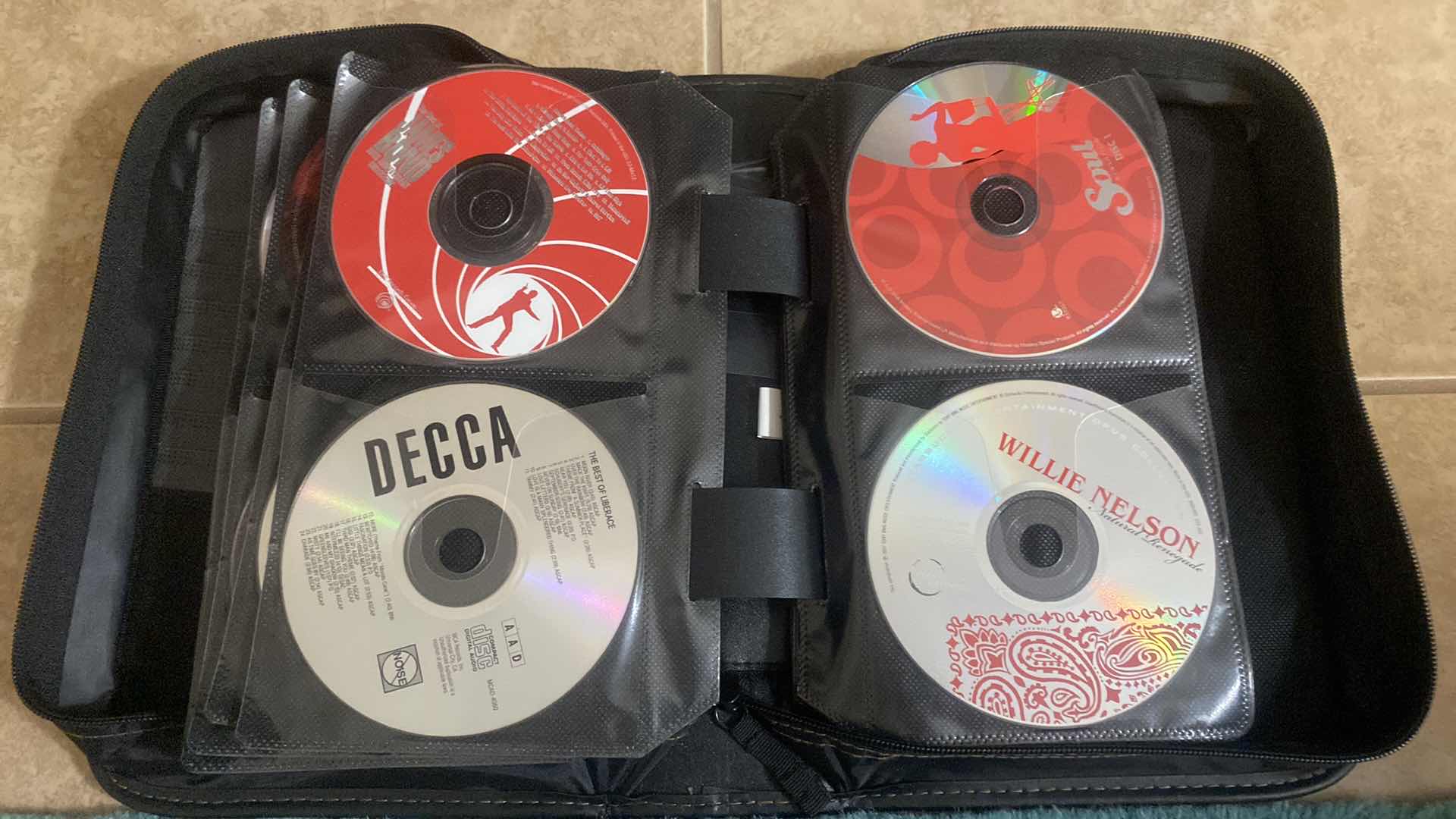Photo 1 of CASE LOGIC CD WITH ASSORTED CDS