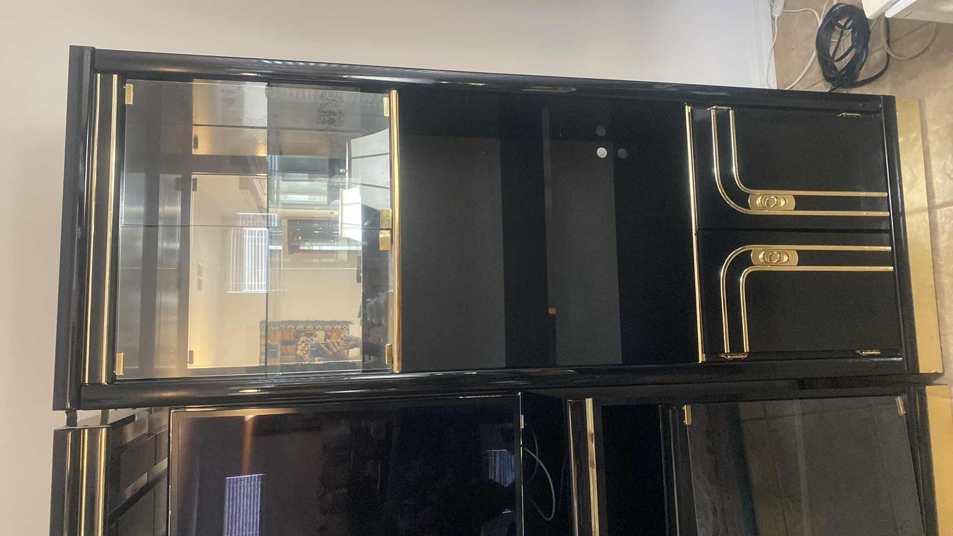 Photo 1 of 3PCS-POST MODERN 1980s BLACK LACQUER ENTERTAINMENT CENTER W HOLLYWOOD REGENCY BRASS/GOLD METALLIC TRIM,SMOKED GLASS- END PIECES MEASURE 27” X 16 1/2” H 76” MIDDLE PIECE MEASURES 4’ X 16 1/2” H 76”