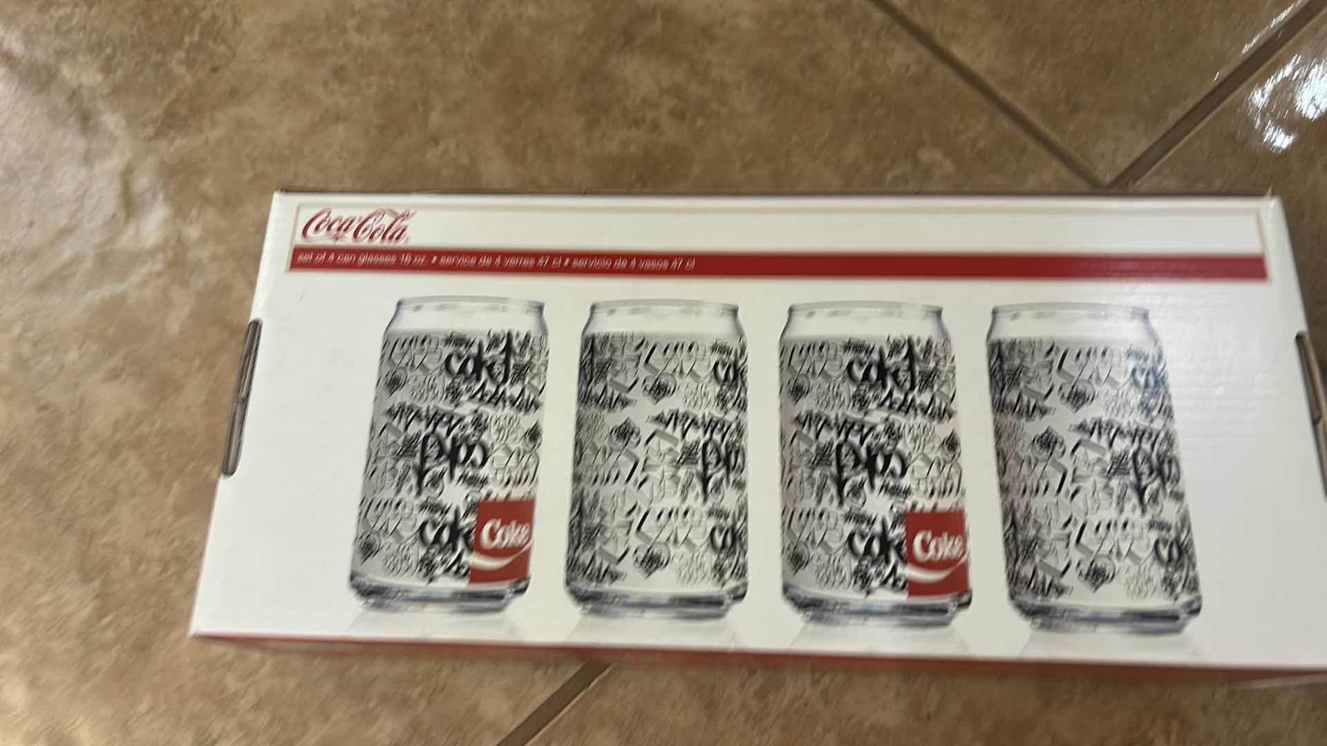 Photo 1 of COCA-COLA 7 PIECE GLASSWARE SET WITH BLACK & WHITE GRAPHIC DESIGN- COLLECTIBLE COKE DRINKING GLASES ESTIMATED RETAIL VALUE:$50