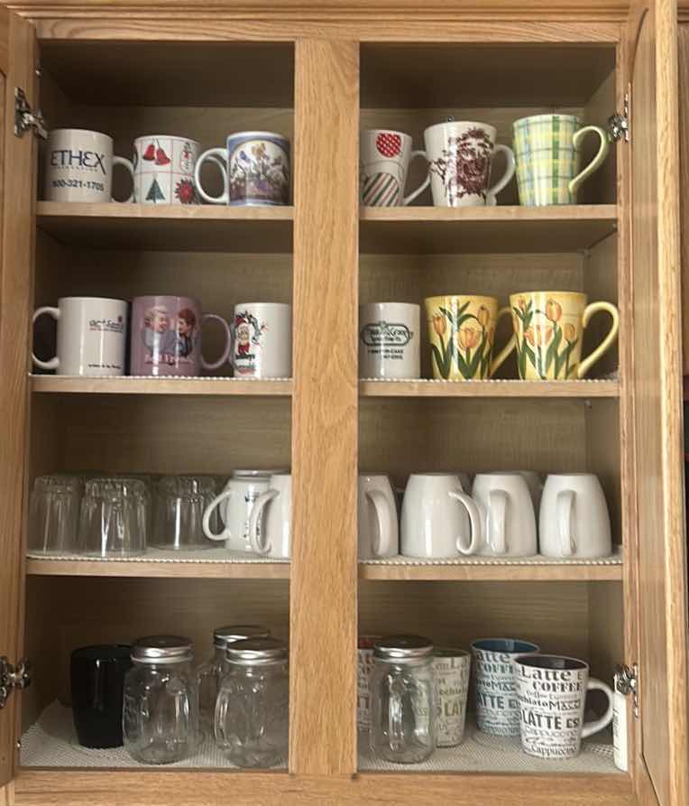 Photo 1 of CONTENTS OF CABINET IN KITCHEN-COFFEE MUGS AND MORE