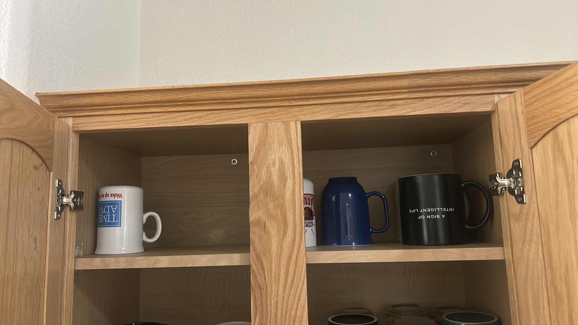 Photo 1 of CONTENTS OF KITCHEN CABINET