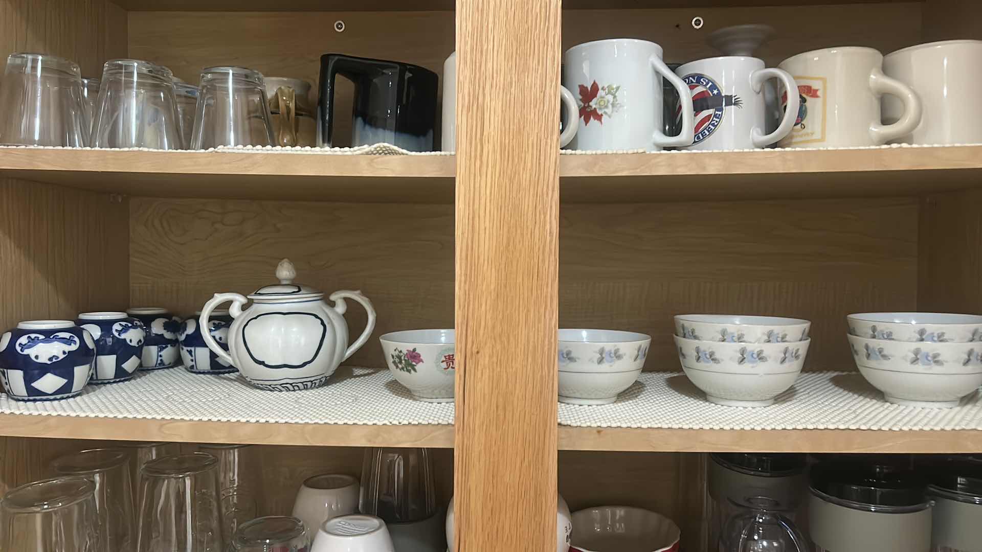 Photo 1 of CONTENTS OF KITCHEN CABINET-DISHES