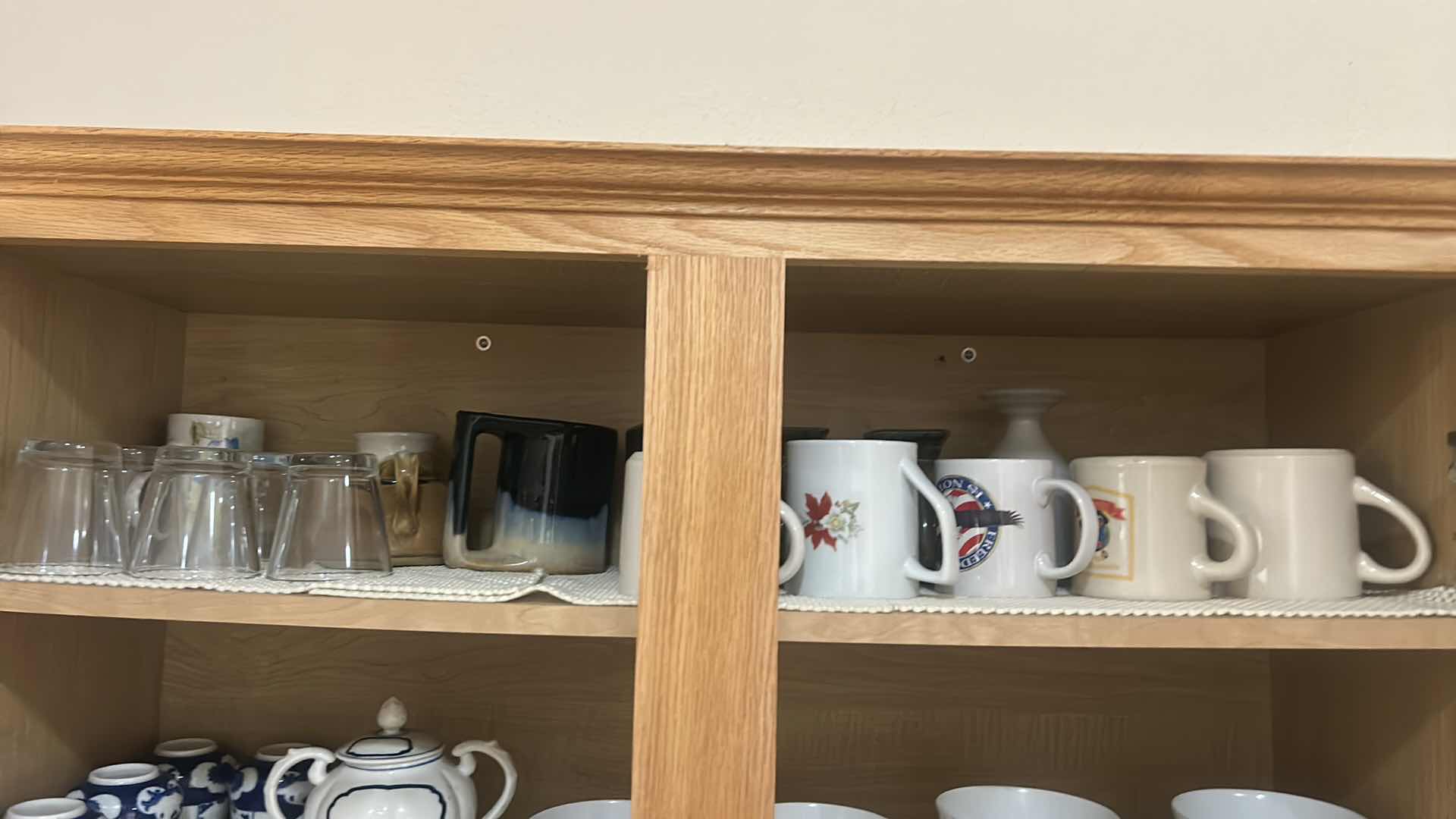 Photo 1 of CONTENTS OF KITCHEN CABINET-DISHES