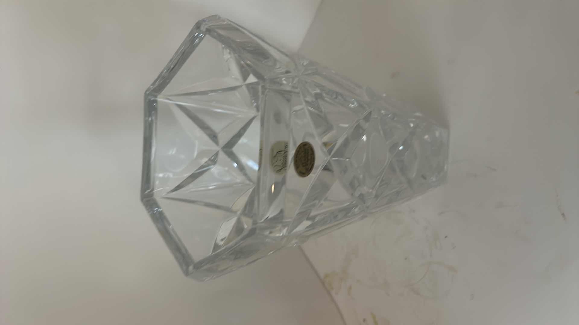View 4 of CRISTAL ARQUES FRANCE - HAND CUT LEAD CRYSTAL VASE WITH GEOMETRIC FACETED DESIGN AND ORIGINAL LABEL.
ESTIMATED RETAIL VALUE: $75–$125 H9.5”