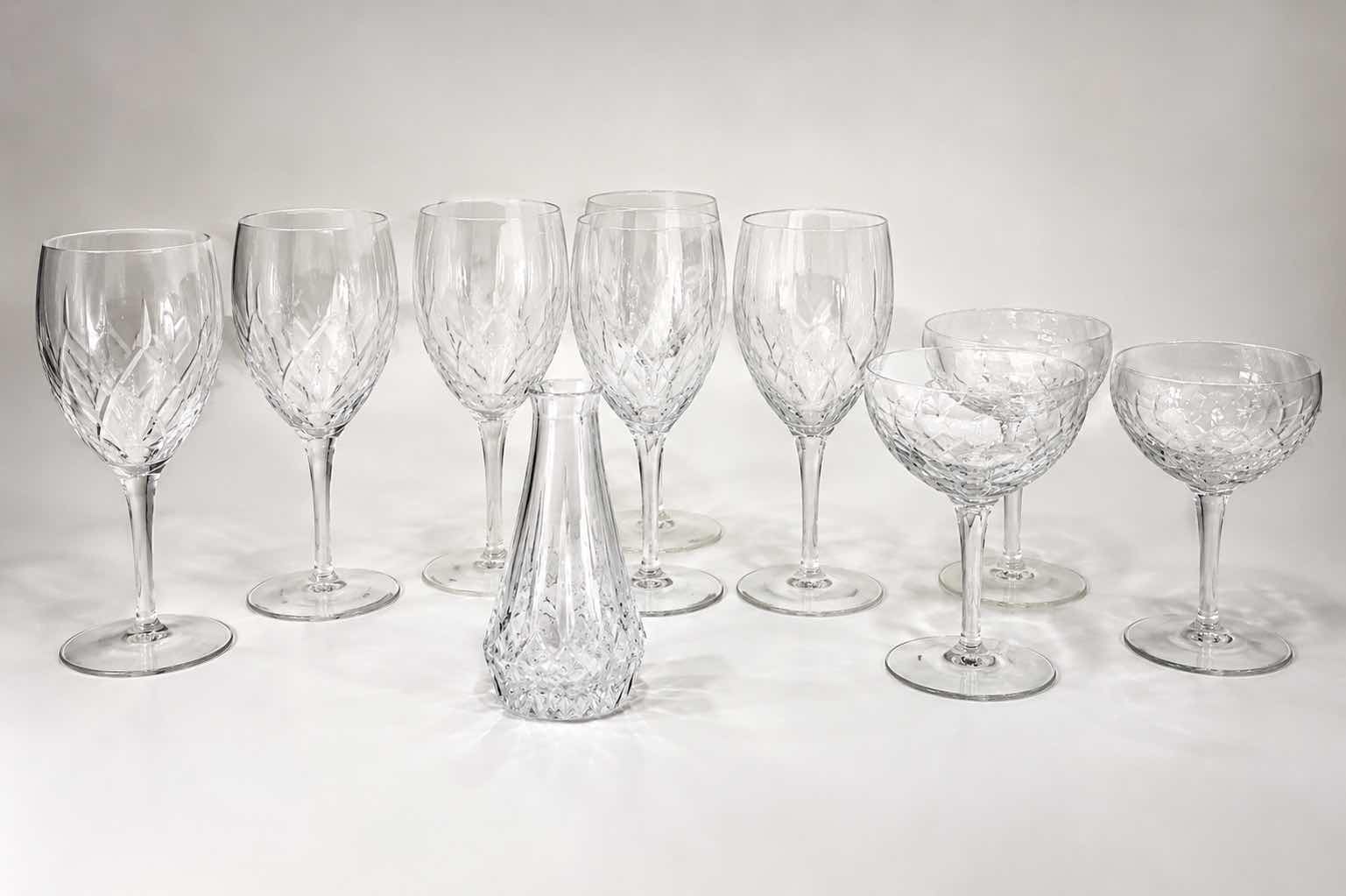 Photo 1 of ASSORTED CLEAR CRYSTAL STEMWARE INCLUDING WINE GLASSES, CHAMPAGNE COUPES AND SMALL CRYSTAL VASE.
ELEGANT CUT-CRYSTAL DESIGN WITH MATCHING PATTERN.
ESTIMATED RETAIL VALUE: $125 FOR THE GROUP.