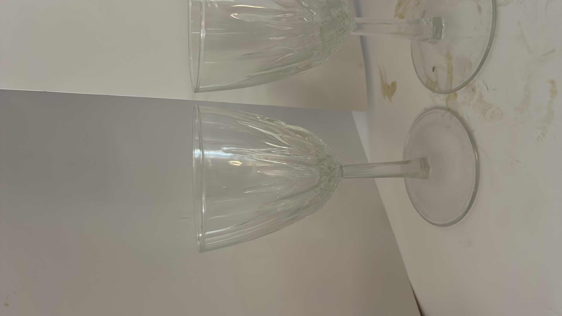Photo 1 of ASSORTED CLEAR CRYSTAL STEMWARE INCLUDING WINE GLASSES, CHAMPAGNE COUPES AND SMALL CRYSTAL VASE.
ELEGANT CUT-CRYSTAL DESIGN WITH MATCHING PATTERN.
ESTIMATED RETAIL VALUE: $125 FOR THE GROUP.
