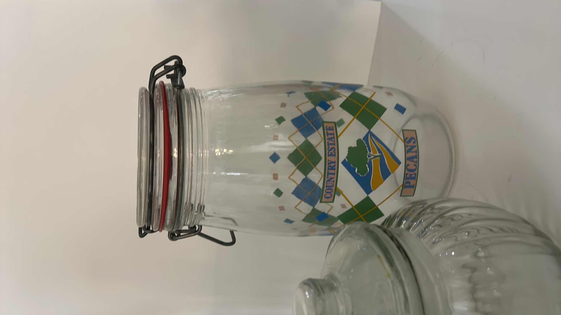 Photo 1 of ASSORTED CLEAR GLASS KITCHEN STORAGE JARS, CANISTERS & BOTTLE WITH CORK, GLASS AND CLAMP-TOP LIDS
