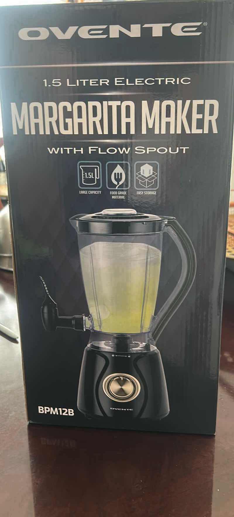 View 2 of OVENTE 1.5 LITER ELECTRIC MARGARITA MAKER WITH FLOW SPOUT, MODEL BPM12B BPA-FREE PITCHER WITH ICE-CRUSHING FUNCTION
ESTIMATED RETAIL VALUE: $50
