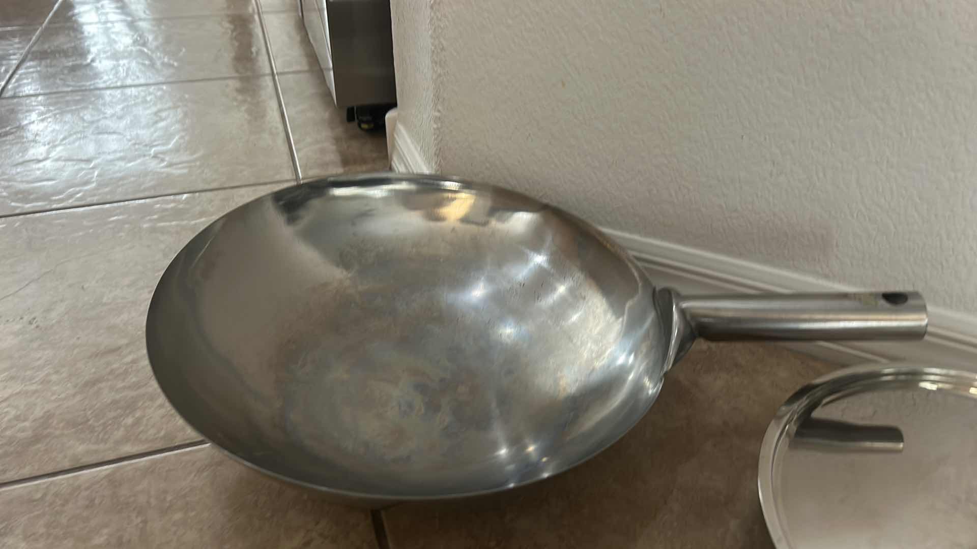 Photo 1 of ASSORTED COOKWARE LOT WITH WOKS, SKILLET, LIDDED PAN & DOME LIDS
MIXED STAINLESS STEEL AND NONSTICK COOKWARE
ESTIMATED RETAIL VALUE: $100–$150