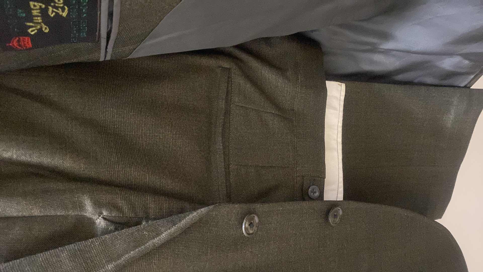 Photo 1 of HAND FASHIONED MEN’S SUIT FROM HONG KONG ESTIMATED SIZE 36 TO 40