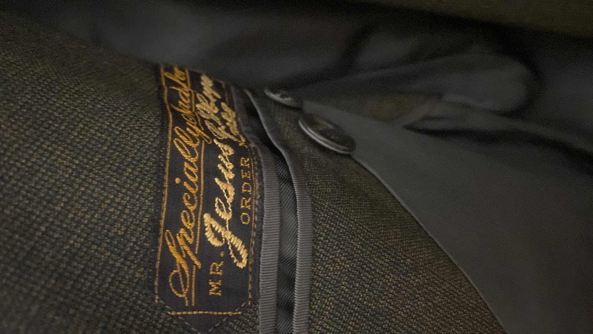 Photo 1 of HAND FASHIONED MEN’S SUIT FROM HONG KONG ESTIMATED SIZE 36 TO 40