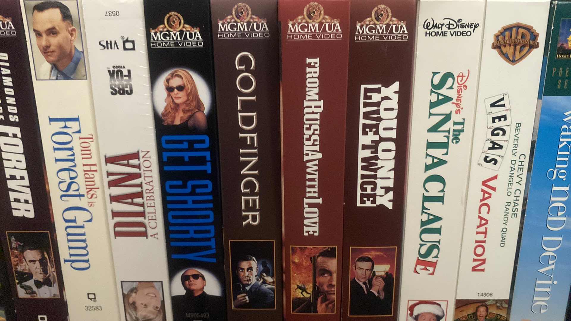 Photo 1 of SHELF OF VHS MOVIES SEE PHOTOS