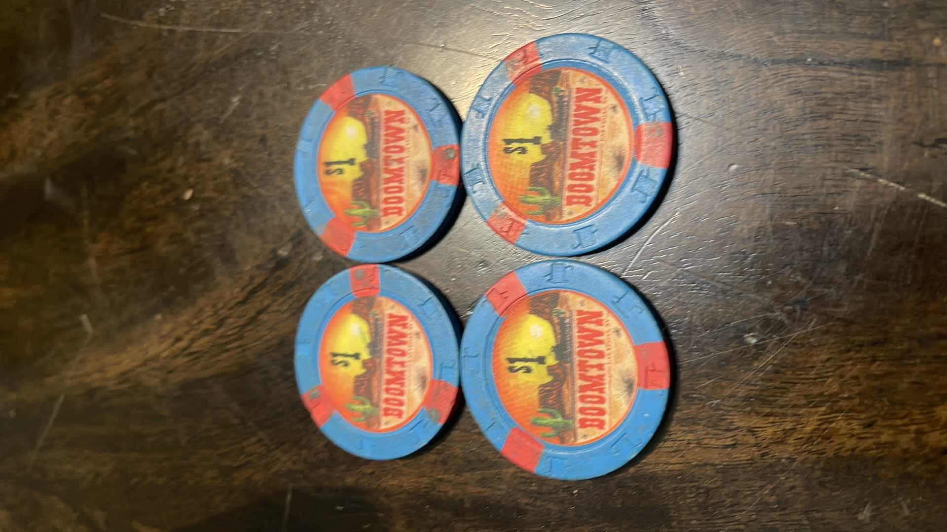 Photo 1 of (4) $1 1ST EDITION GAMING CHIPs FROM THE BOOMTOWN CASINO LAS VEGAS NV