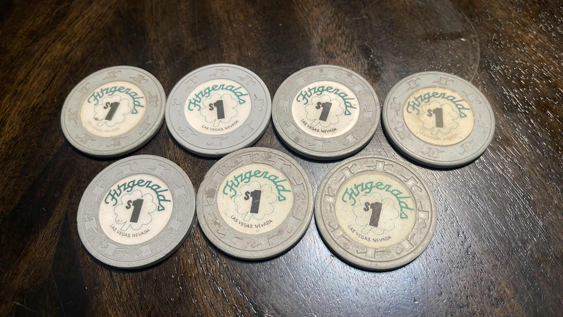 Photo 1 of (7) VINTAGE $1 FITZGERALDS GAMING CHIPS