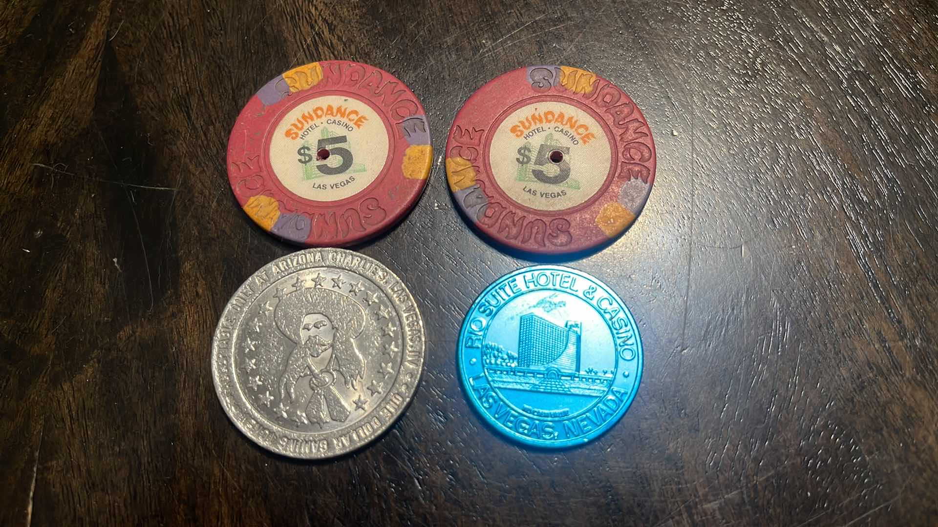 Photo 1 of (4) VINTAGE COLLECTOR’S GAMING CHIPS & COINS