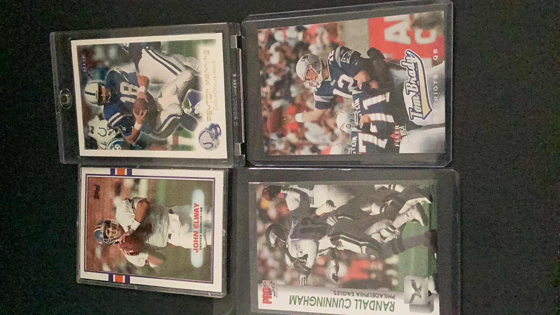 Photo 1 of LOT OF 4 NFL QUARTERBACK CARDS: BRADY, MANNING, ELWAY, CUNNINGHAM