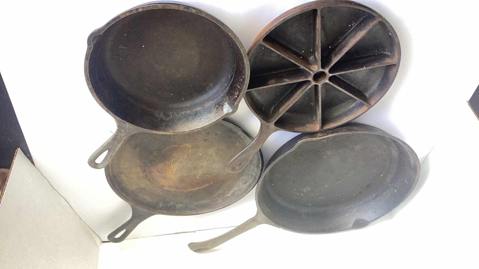 Photo 1 of 4 PIECE CAST IRON SKILLET SET