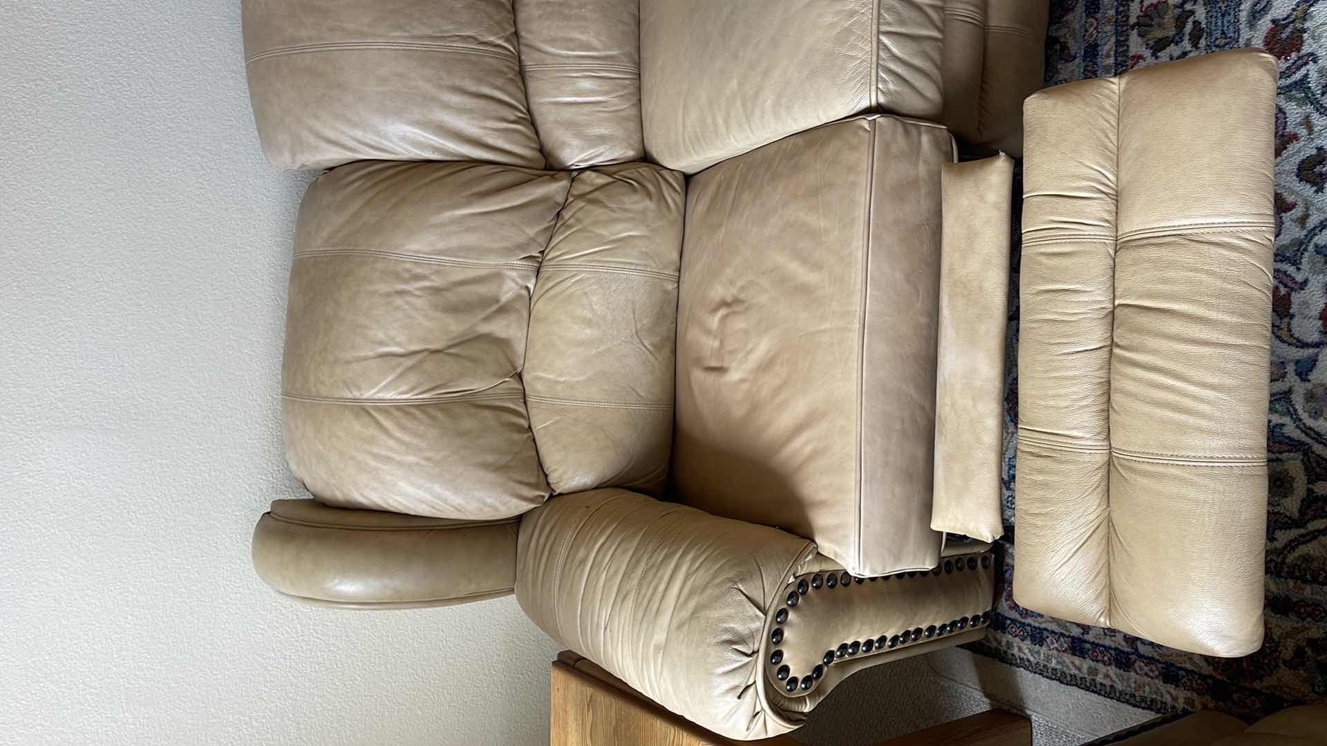 Photo 4 of DOUGLAS 7.5’ LEATHER RECLINING SOFA (MATCHING LOVESEAT SOLD SEPARATELY) HAS TEAR IN ARM