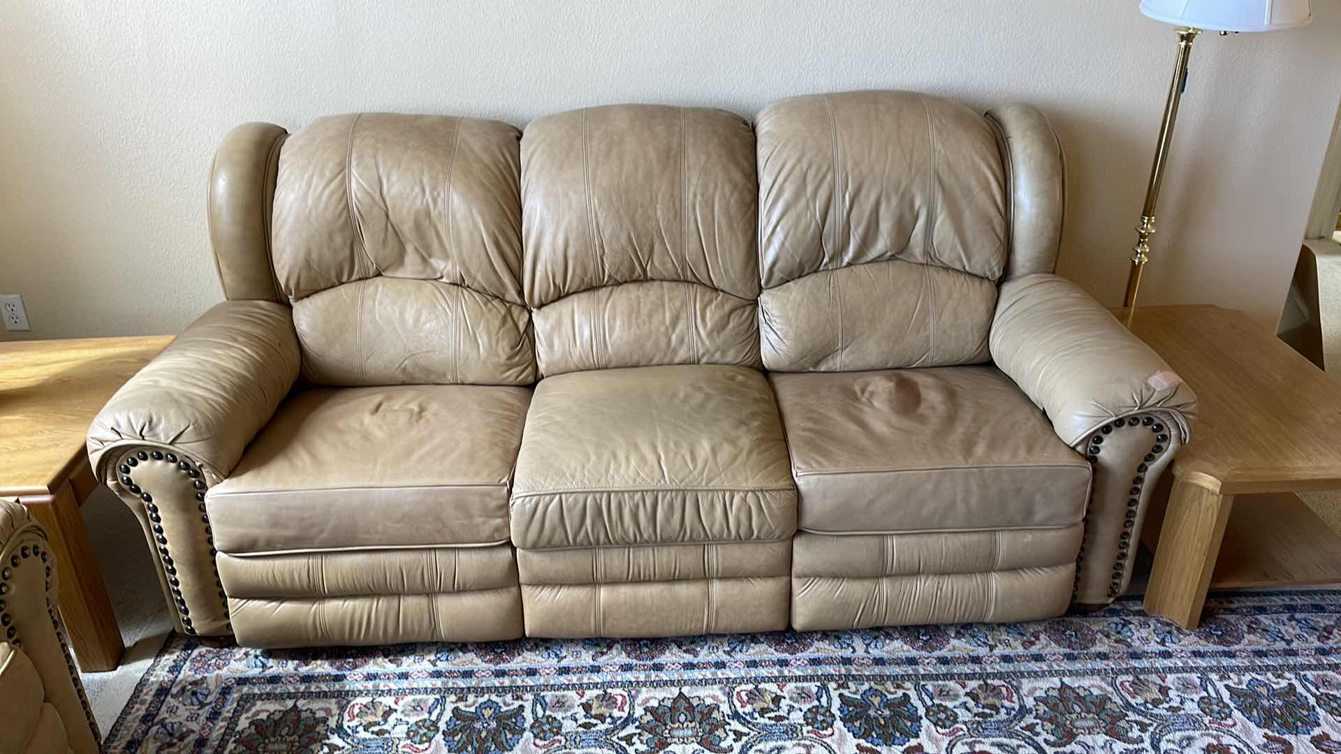 Photo 2 of DOUGLAS 7.5’ LEATHER RECLINING SOFA (MATCHING LOVESEAT SOLD SEPARATELY) HAS TEAR IN ARM