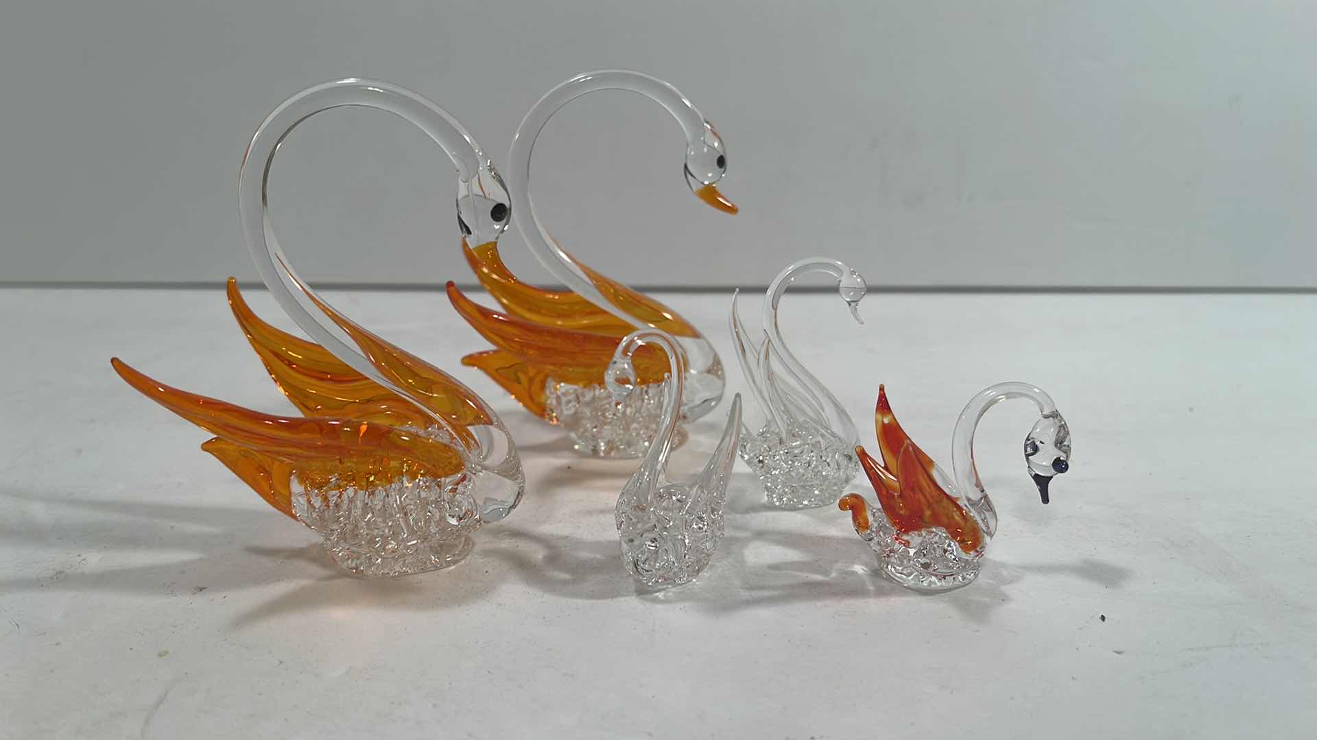 Photo 1 of HANDBLOWN GLASS SWANS