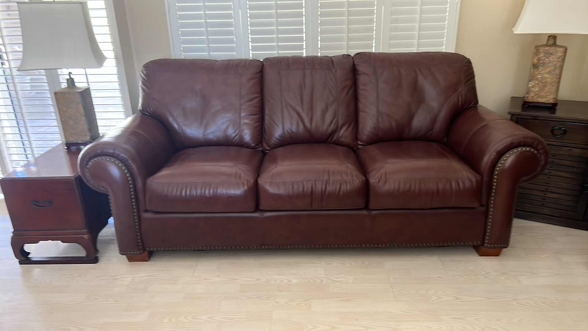 Photo 6 of BURGUNDY LEATHER SOFA W BRASS TACK TRIM 87” x 38”