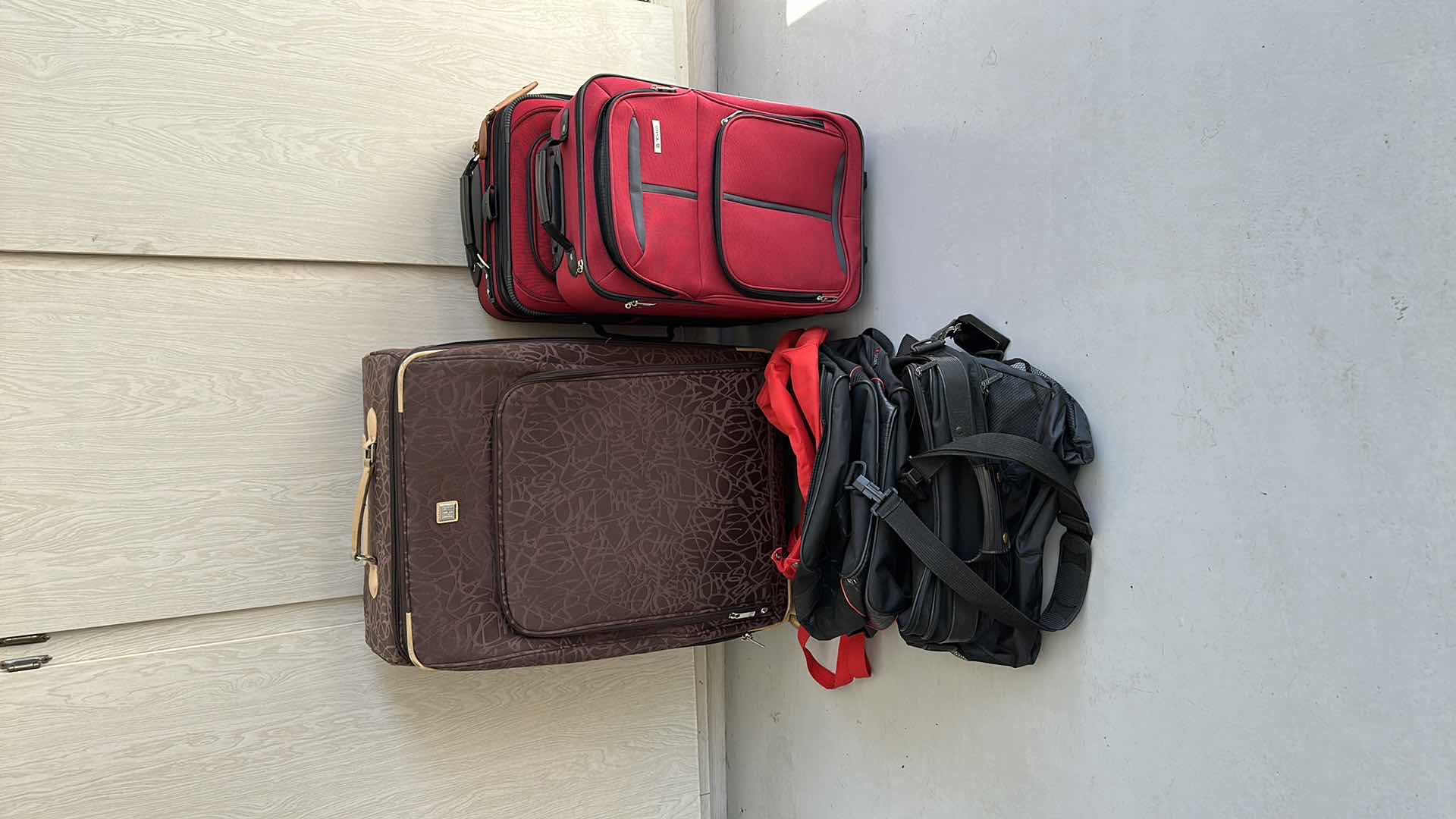 Photo 1 of SUITCASES AND CARRY ON BAGS