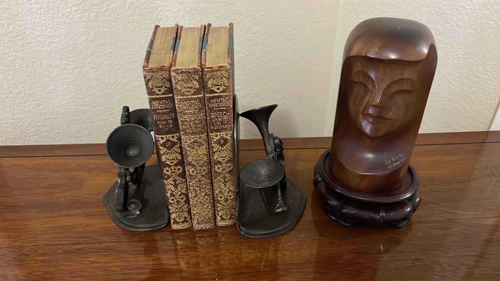 Photo 1 of METAL MUSICAL BOOKENDS W 3 BOOKS, WOOD HEAD STATUE