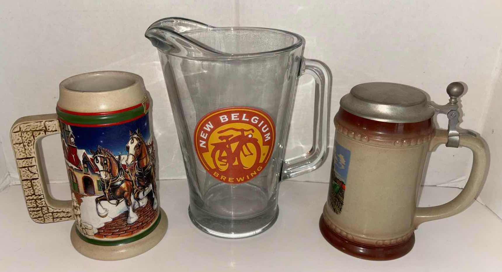 Photo 1 of ANHEUSER-BUSCH GRANTS FARM HOLIDAY1998 HOLIDAY STEIN, LIDDED GERMAN STEIN & NEW BELGIUM BREWING GLASS PITCHER