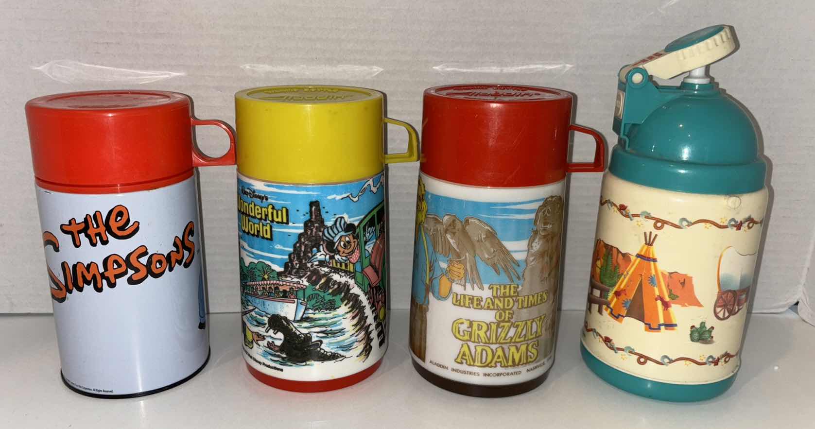 Photo 1 of ALADDIN THERMOS’ (DISNEY WONDERFUL WORLD & GRIZZLY ADAMS), NECA (SIMPSONS) & PECO WARE NATIVE THERMOS